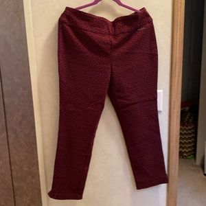 Straight leg pants with a slit on the bottom, maroon with black diamond design
